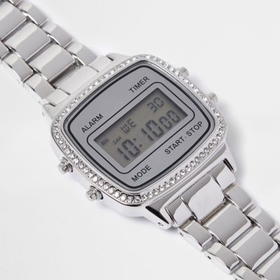 Silver tone gem encrusted digital watch